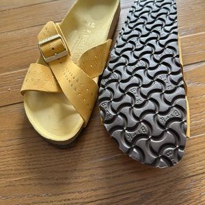 Soft yellow Birkenstock leather sandals never worn